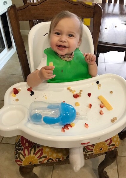 happy baby eating BLW foods