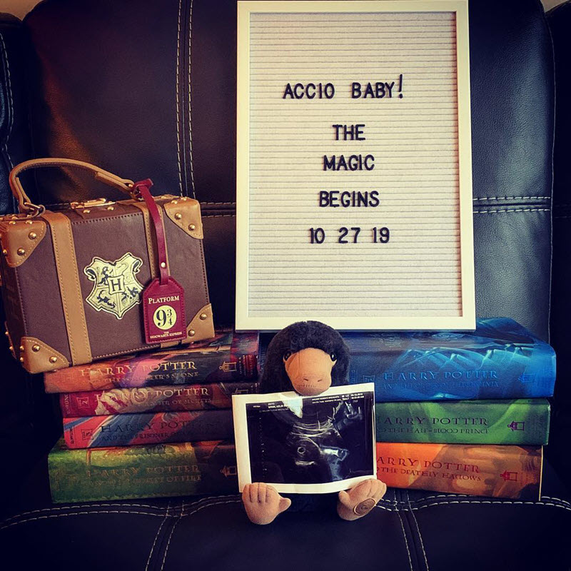 Harry Potter pregnancy announcement with letterboard and Harry Potter books 