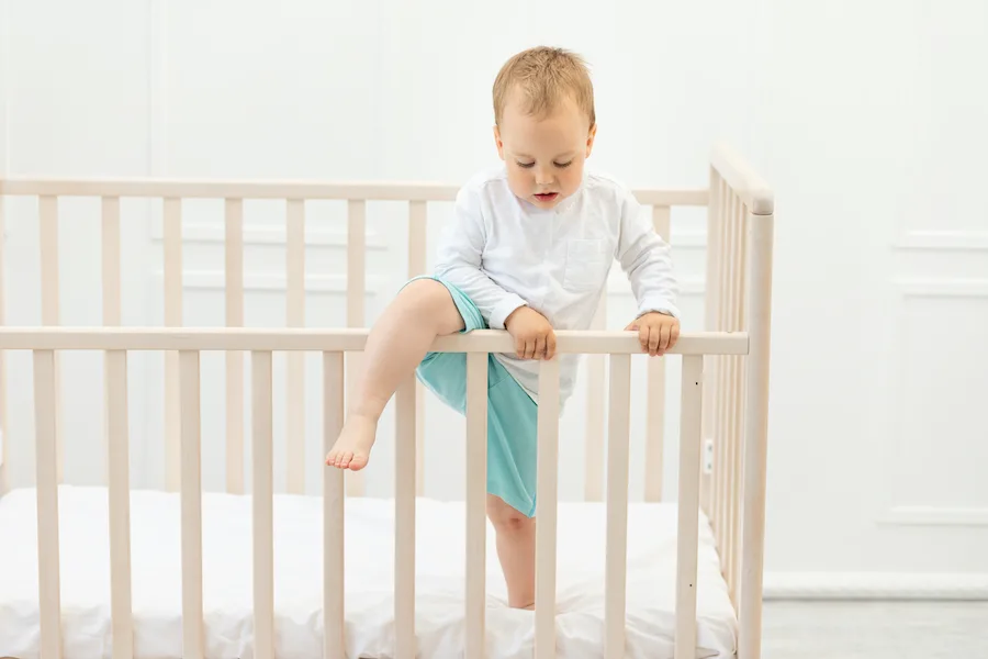 Should A Crib Be Against A Wall?