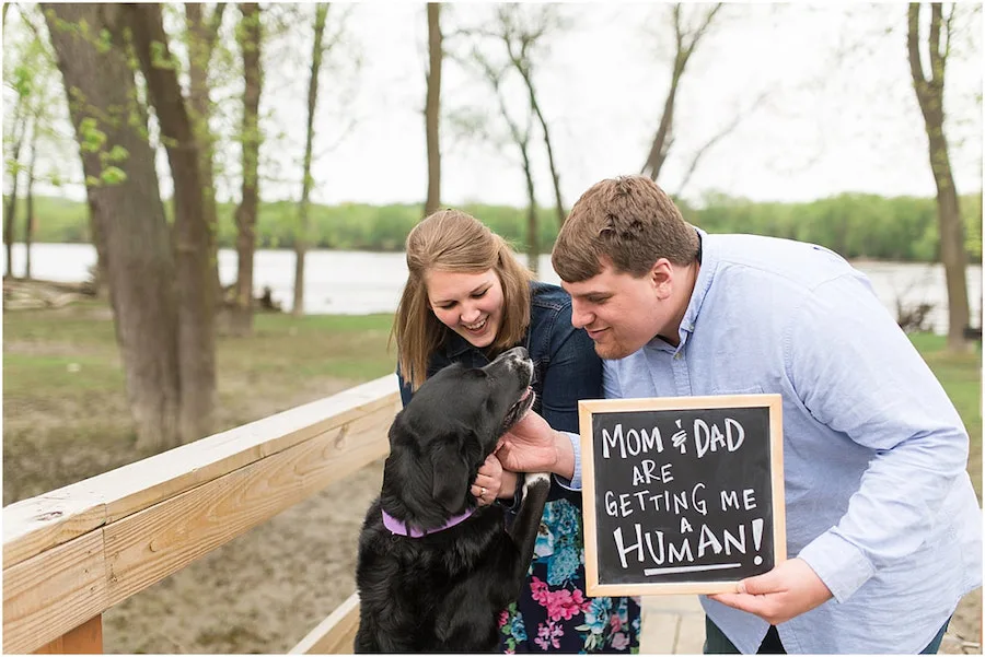 mom and dad with dog pregnancy announcement