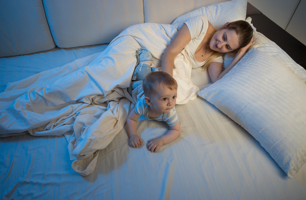 two year old sleep regression, toddler lying with mom at night