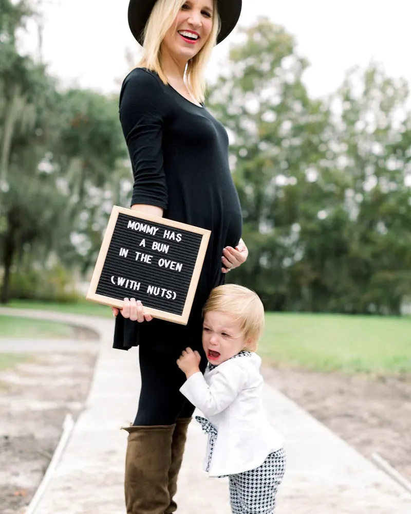 funny mom and baby girl pregnancy announcement