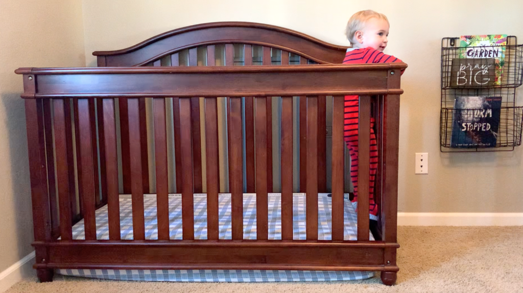 Stop baby climbing shop out of cot