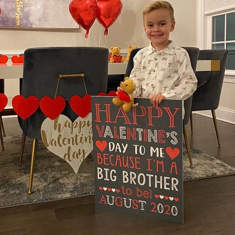 big brother chalkboard pregnancy announcement on Valentine's Day