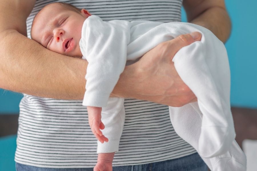 colic hold to help baby sleep
