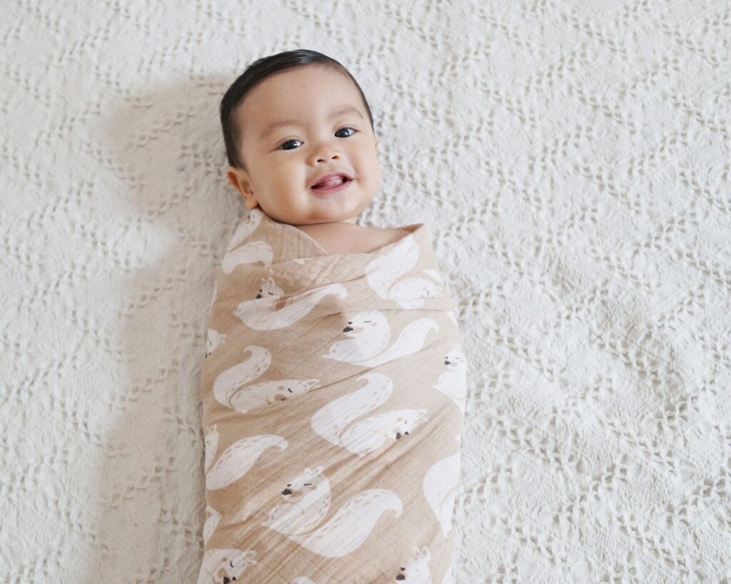baby swaddled in TOG rating 0;5 TOG rating swaddle