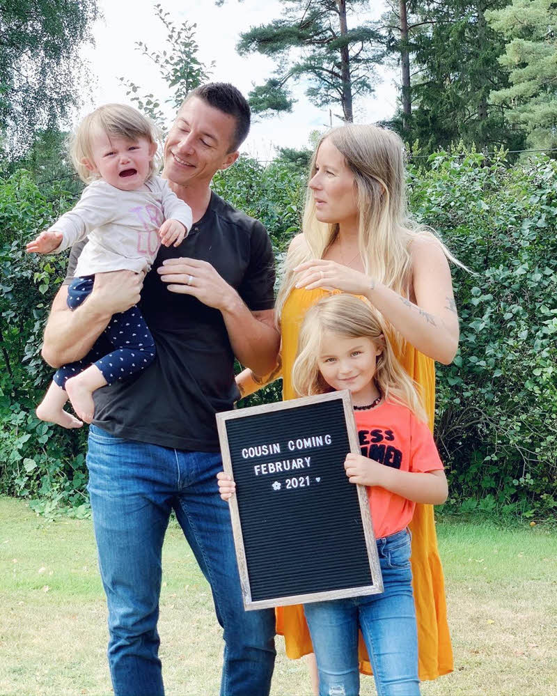 family letter board pregnancy announcement