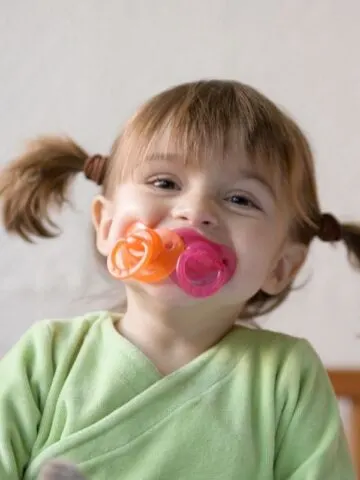 toddler with pacifier