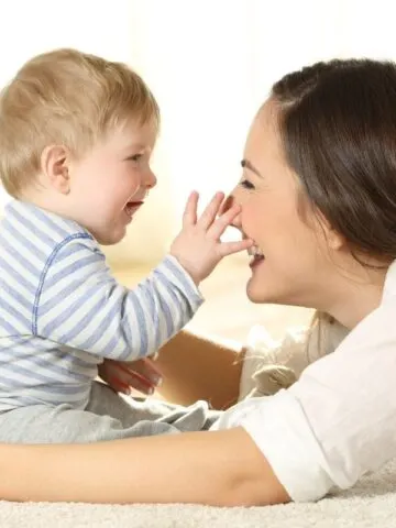 mom and baby playing during activity of EASY baby schedule