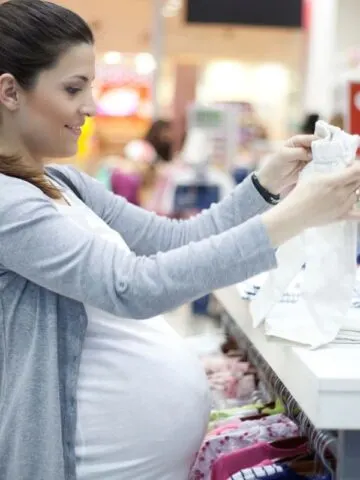 pregnant woman shopping for baby stuff
