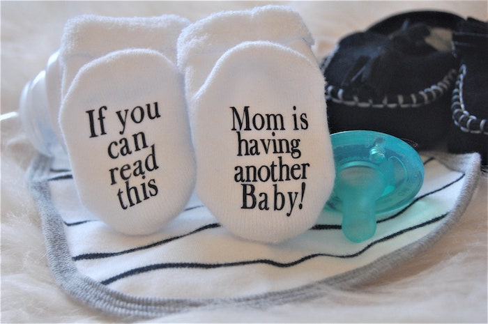pregnancy announcement on baby socks