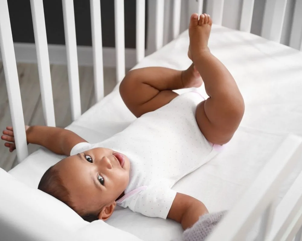 baby awake in crib - can help baby extend 30 minute naps