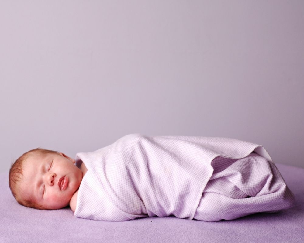 What should a newborn wear to sleep in the summer
