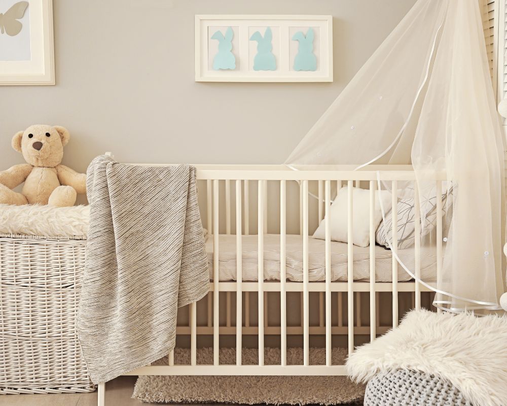 crib with a small canopy on top