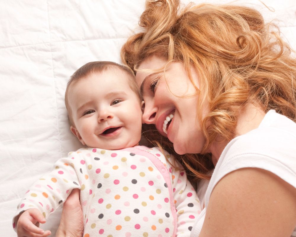 mom and baby cuddling as part of baby bedtime routine