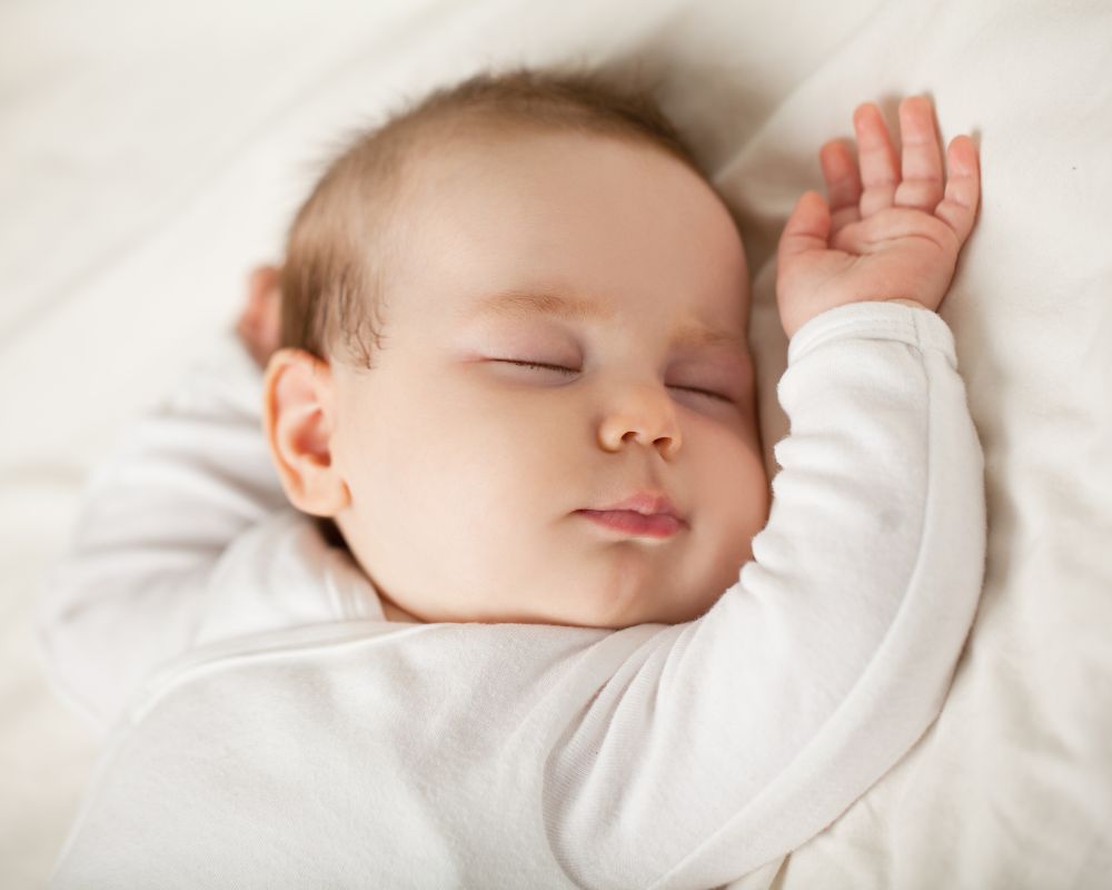 baby napping in crib