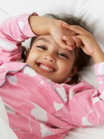 Toddler happy in bed