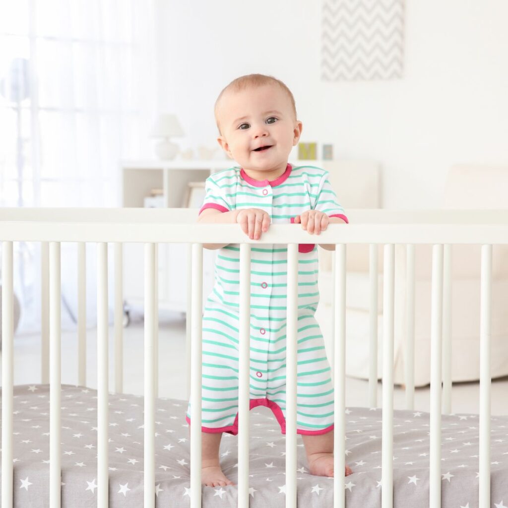 baby standing in crib not sleeping
