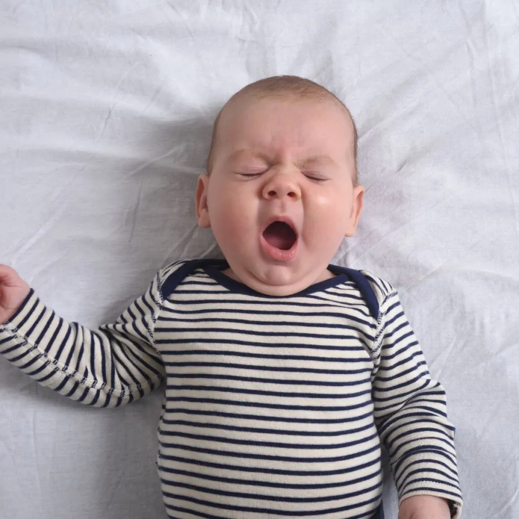 Baby yawning before nap