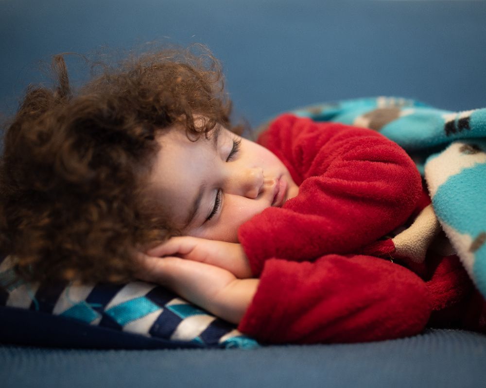 image of 3 year old napping