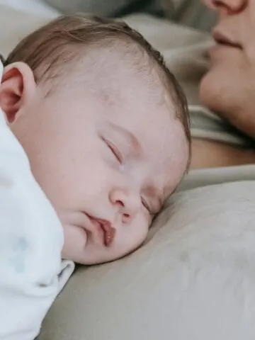 baby contact napping on mom's chest