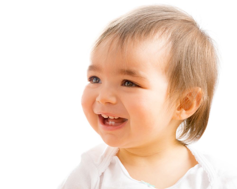 young toddler girl smiling
