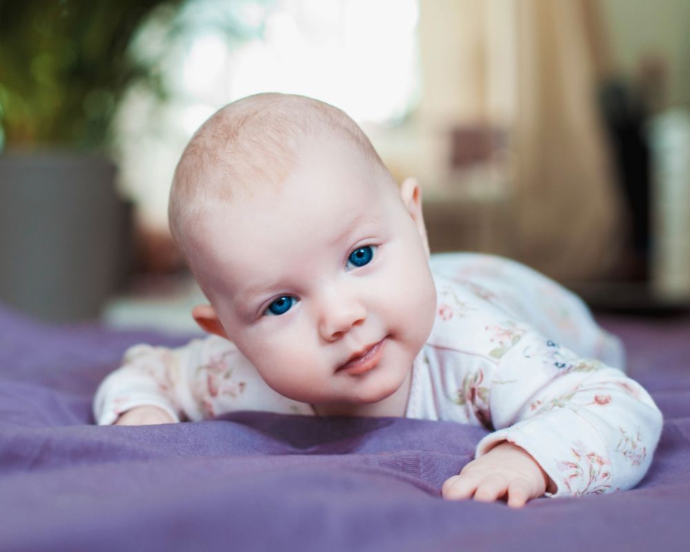 3 month old baby doing tummy time