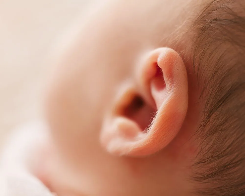 image of baby's ear which can be sensitive to fireworks sounds